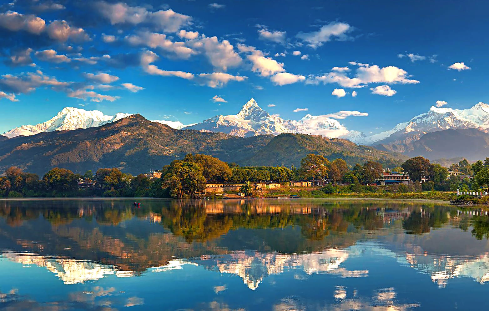 Annapurna range reflected on Phewa Lake